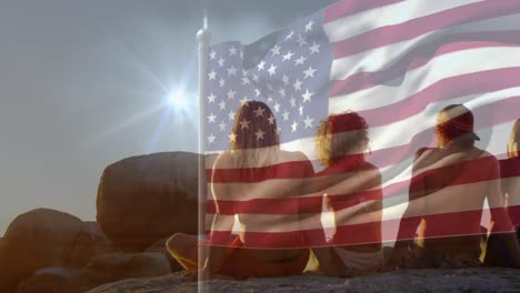 Animation-of-flag-of-usa-over-diverse-group-of-friends-at-beach