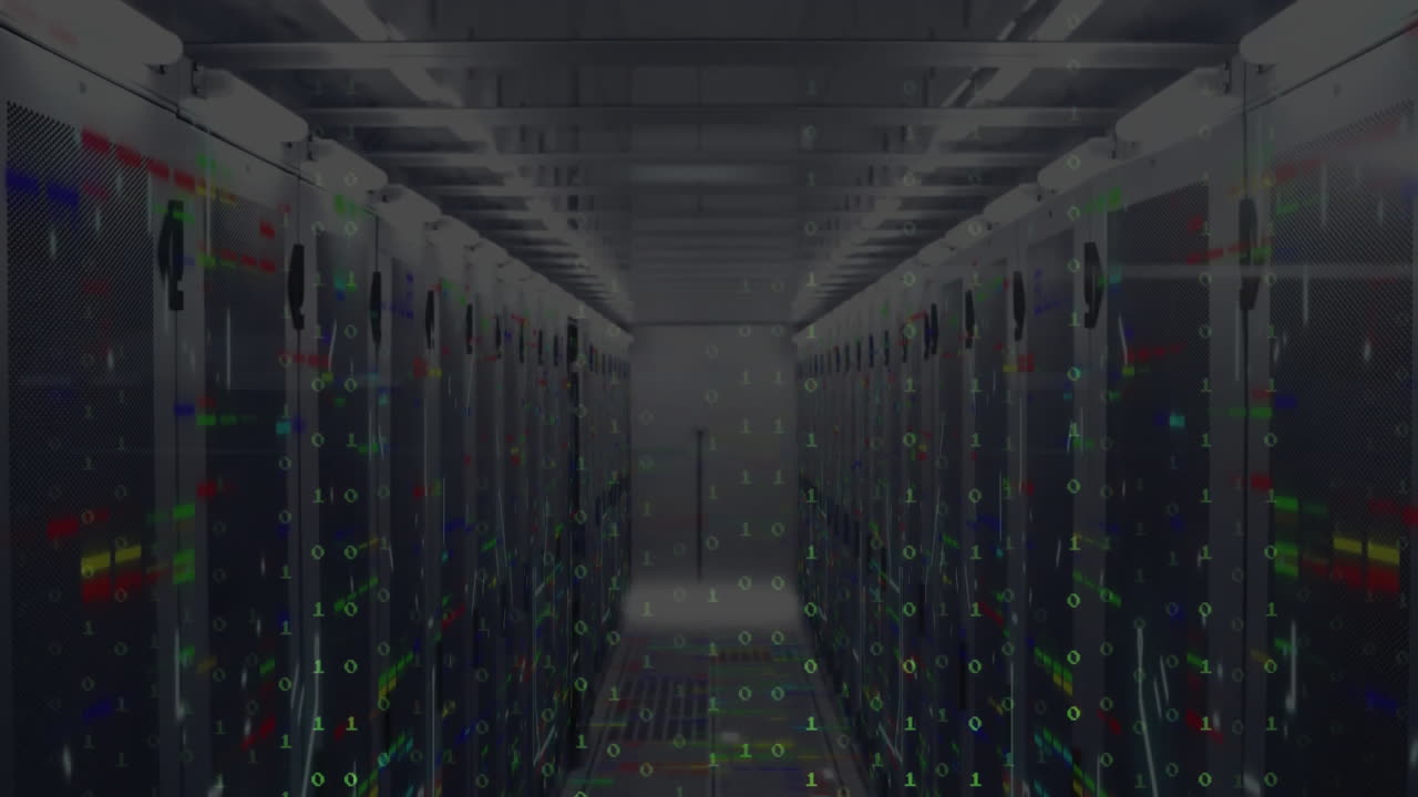 Binary code animating over server racks in data center environment