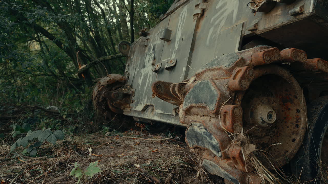Close-up of an Abandoned Rusty Tank in a Forest