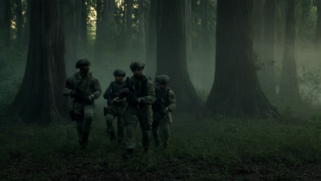 military troops on patrol in foggy forest
