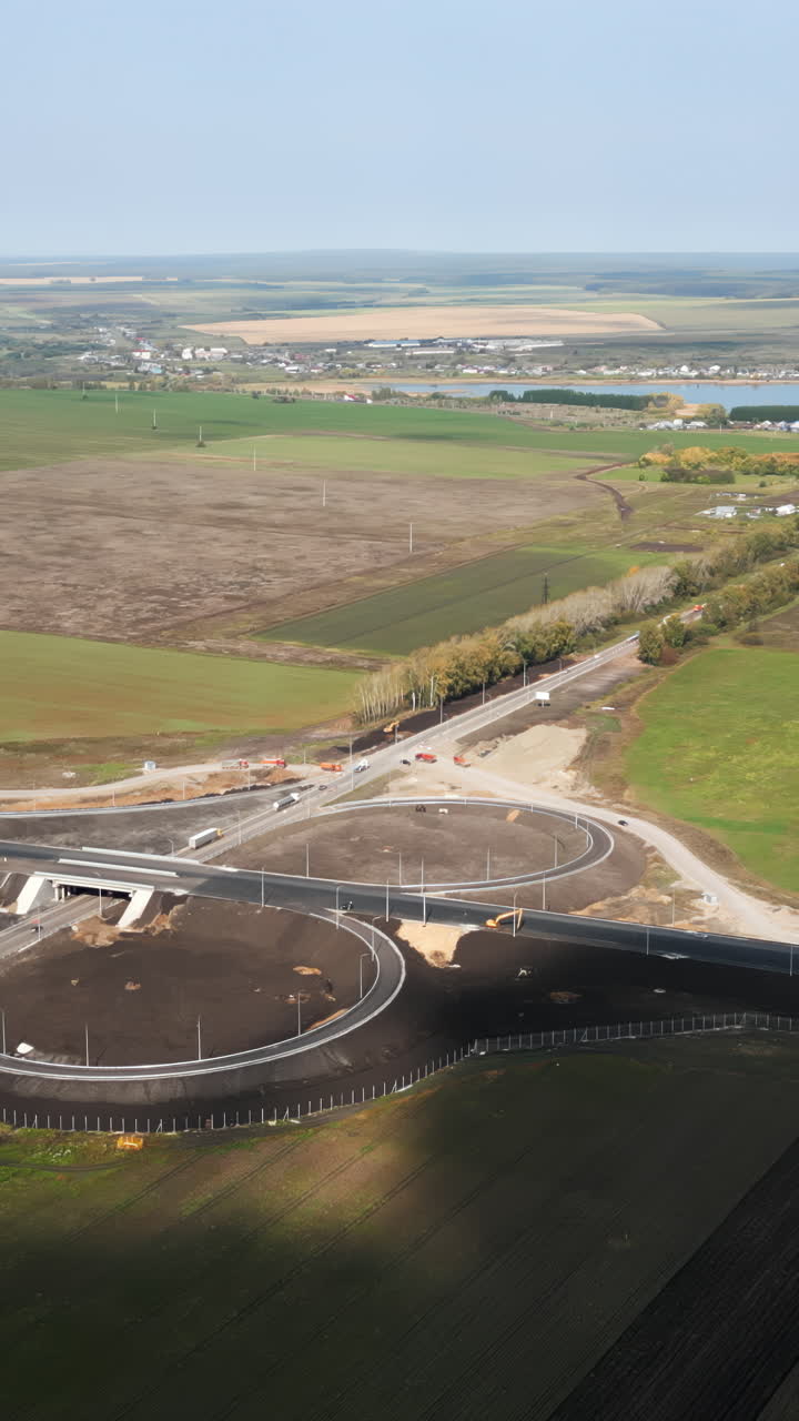 Aerial View of a New Highway Interchange Construction Site in a Rural Landscape