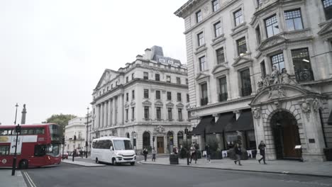 london city street scene with bus and van