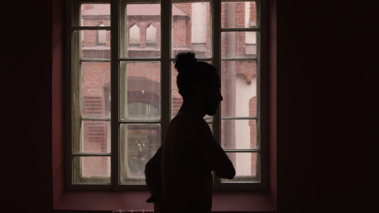 Young man dancing in a classroom