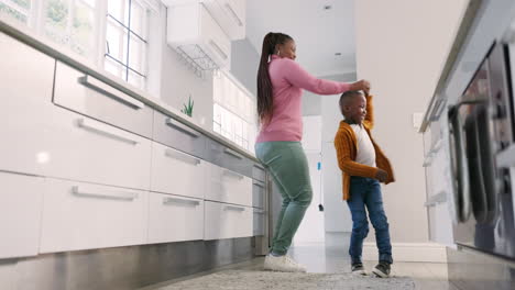 Happy-mother,-kitchen-and-black-family-child