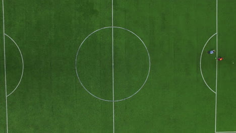 top view of football marker on green field