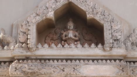 detailed carving on the top of the archway of patuxai victory monument in the center of vientiane, laos