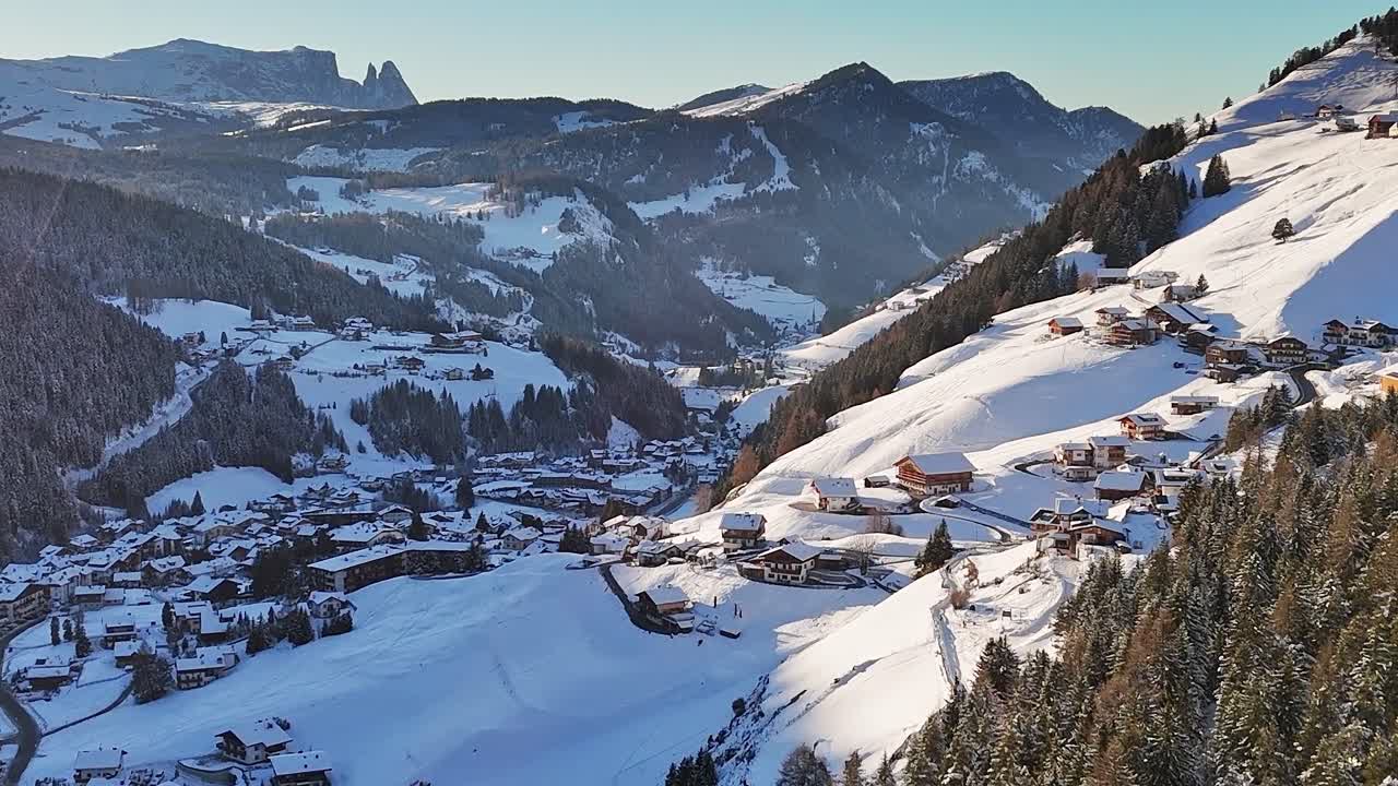 Snow-covered village in the Alps during winter in Italy