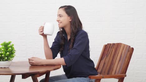 cute indian girl thinking about someone