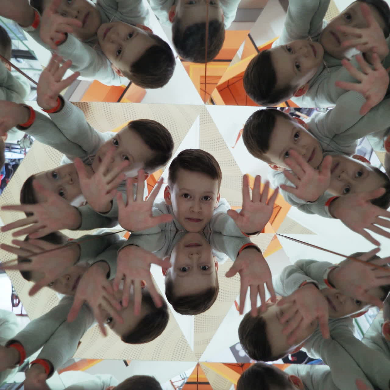 Child in a kaleidoscope tunnel. Glance into infinity Square video