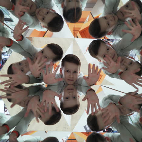 child in a kaleidoscope tunnel. glance into infinity square video