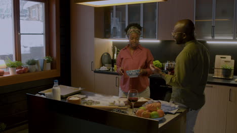 couple talking in the kitchen