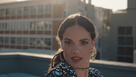 beautiful woman dancing on rooftop young brazilian woman performing latin dance moves in city at sunset