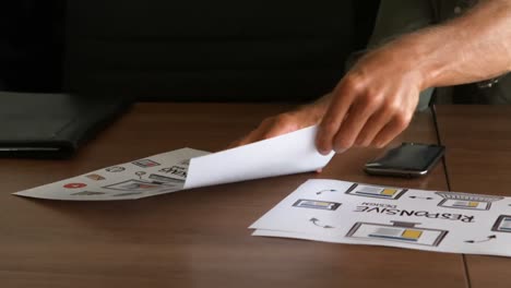 Male-executive-working-at-desk