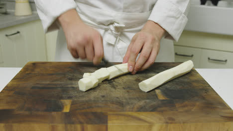 Portioning-radish-chunks-at-kitchen-for-salmon-plating