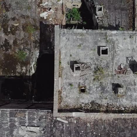 ruined roof of an old abandoned factory. aerial view