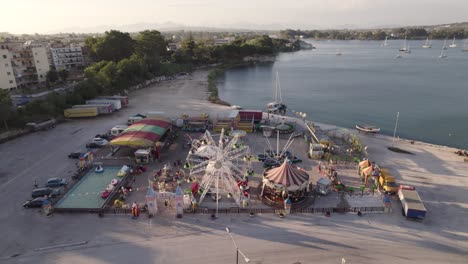 Aerial-shot-of-an-amusement-park-in-Preveza,-Greece