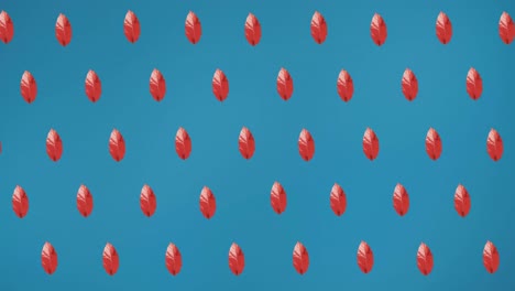 animación de filas de hojas rojas de otoño sobre fondo azul