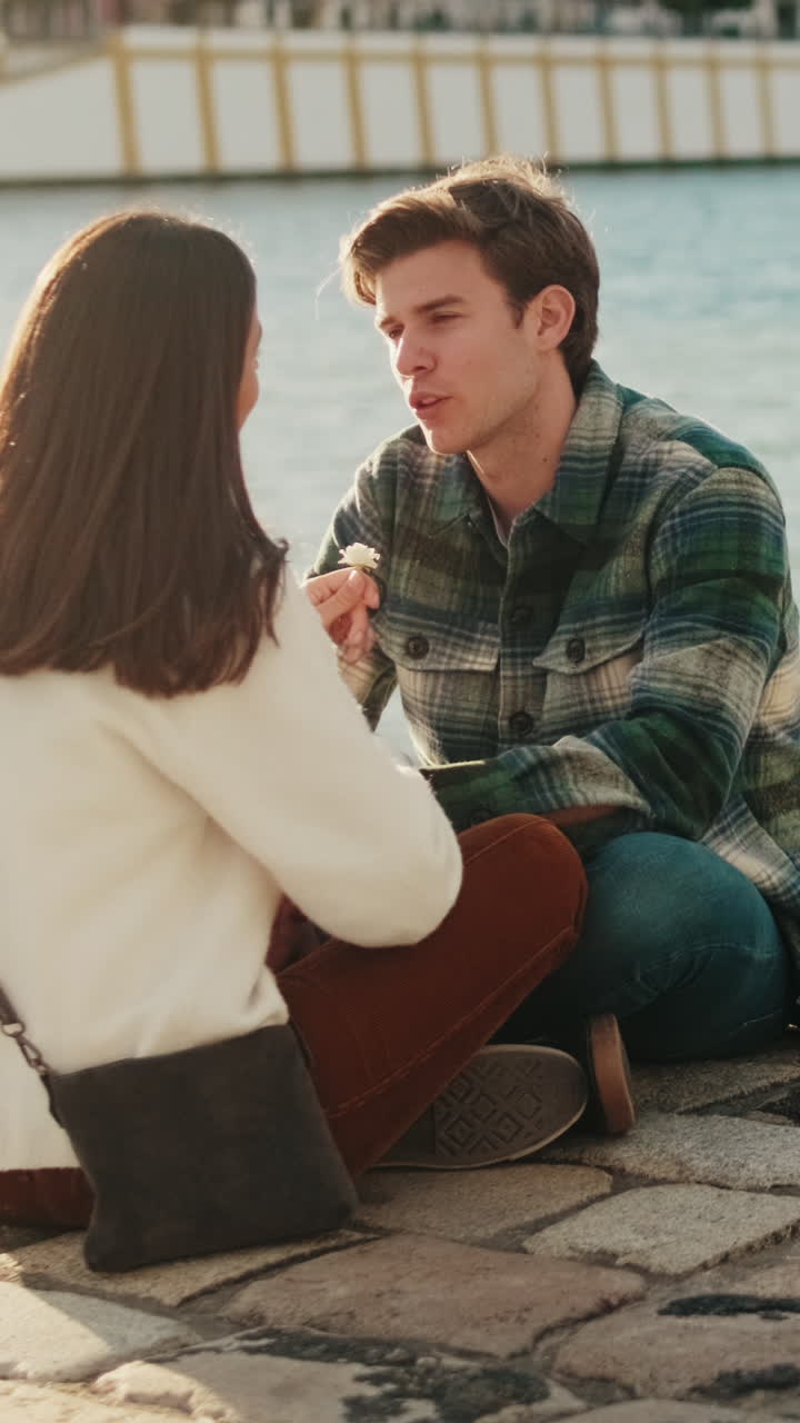 Young Couple near the River in Seville