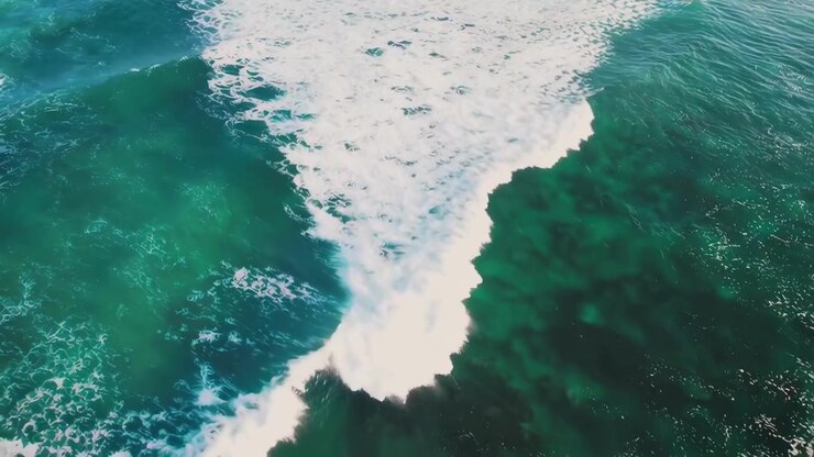 Aerial Top Down View of a Crashing Ocean Wave