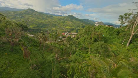 fpv aerial - flying over a village in cebu, philippines