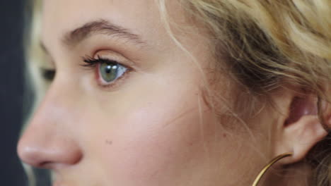 eyes, profile and macro of face of woman with blue