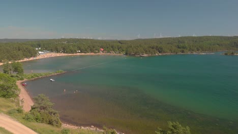 drone desending with wiev over beach, sea and sky