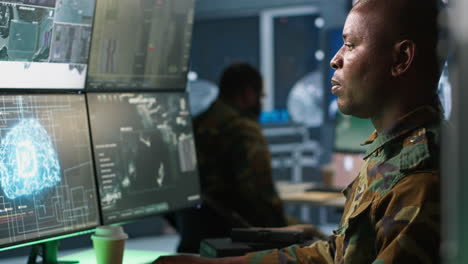 army professional employing ai tech to improve military combat systems