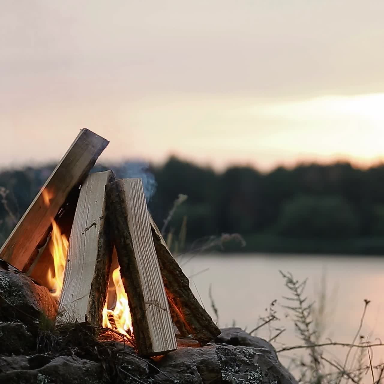 Close Up Of Big Outdoor Bonfire. Close up shot of a fire and firewood burning in outdoor