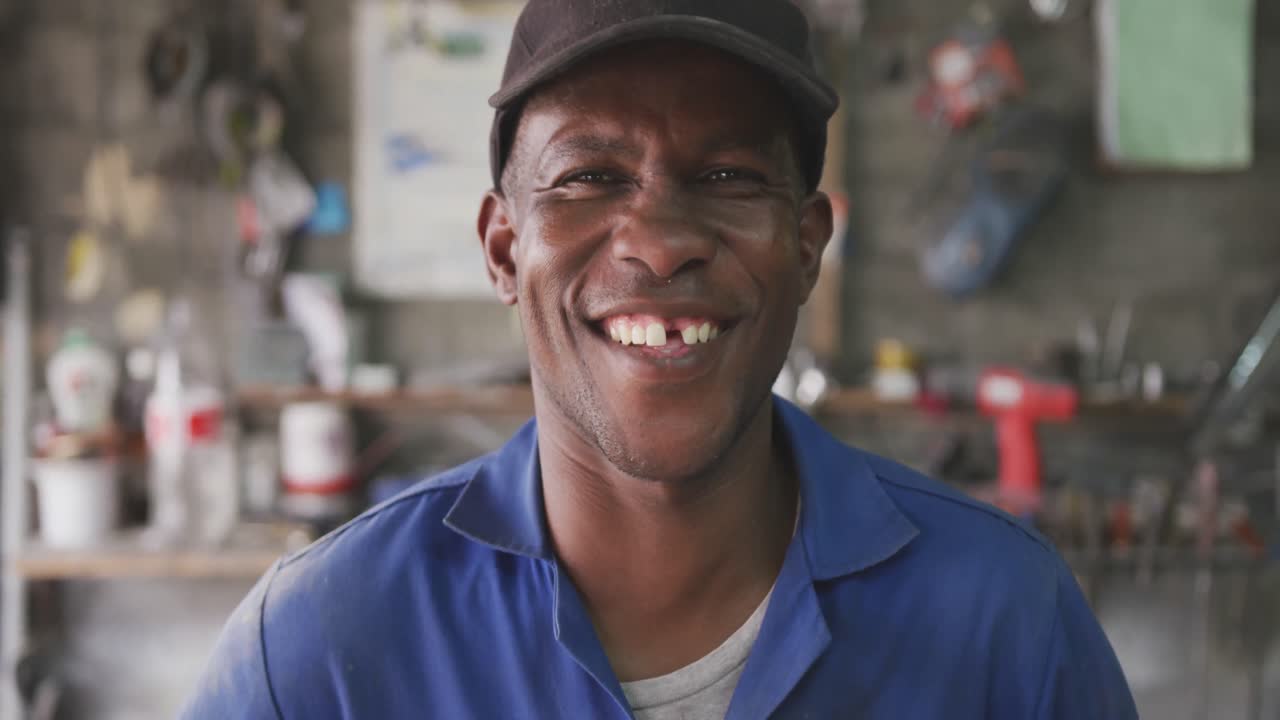 African man looking at the camera