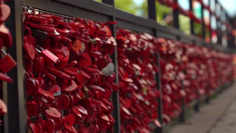 bridge that is covered with heart shape locks in fishmongers district in colmar