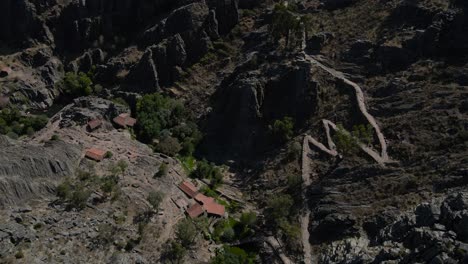 old rural village and castle on rock spur, penha garcia in portugal