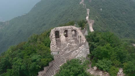 old deteriorated lookout tower of great wall of china on a cloudy day