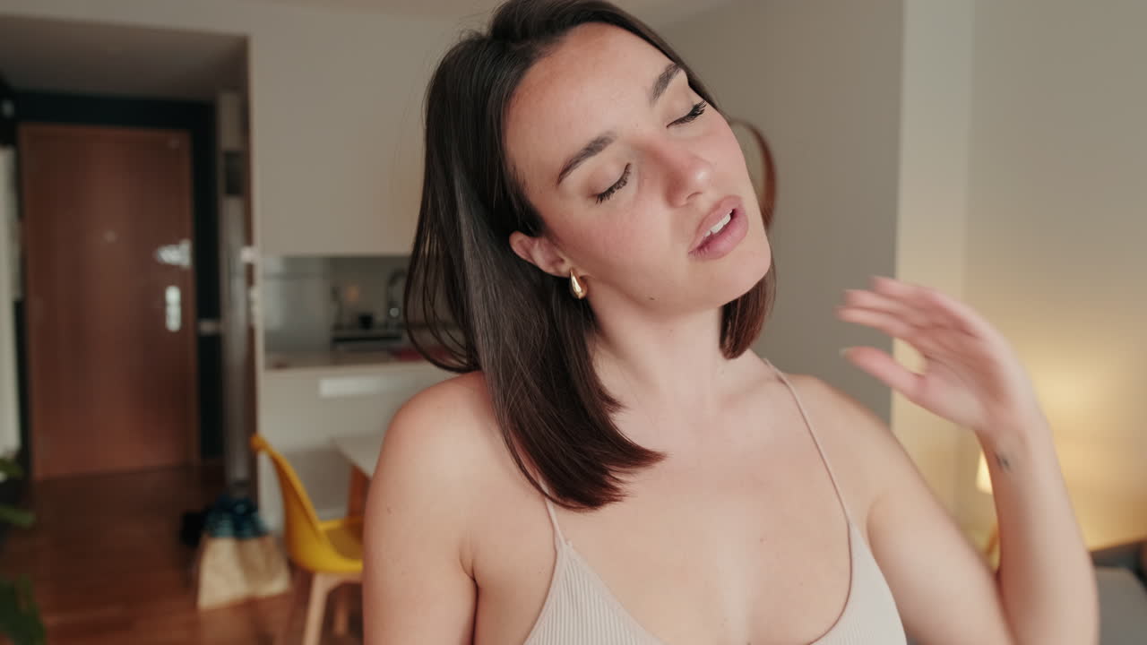 Woman Stretching Neck at Home