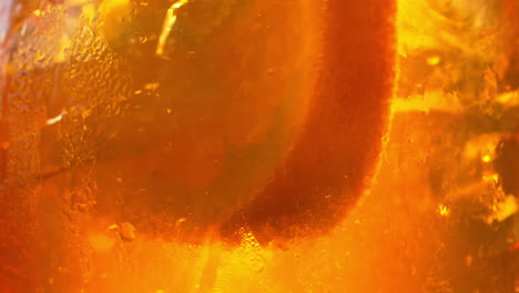 refreshing orange drink in the sun - 180fps