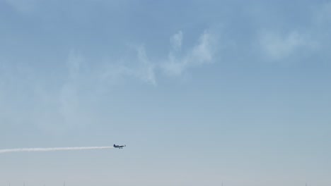 planes performing stunts in clear blue sky