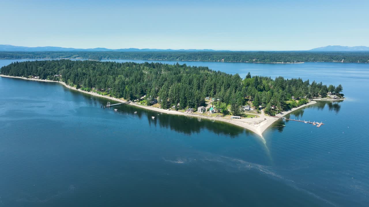 Wide aerial view of Herron Island, a private community in Washington's Puget Sound