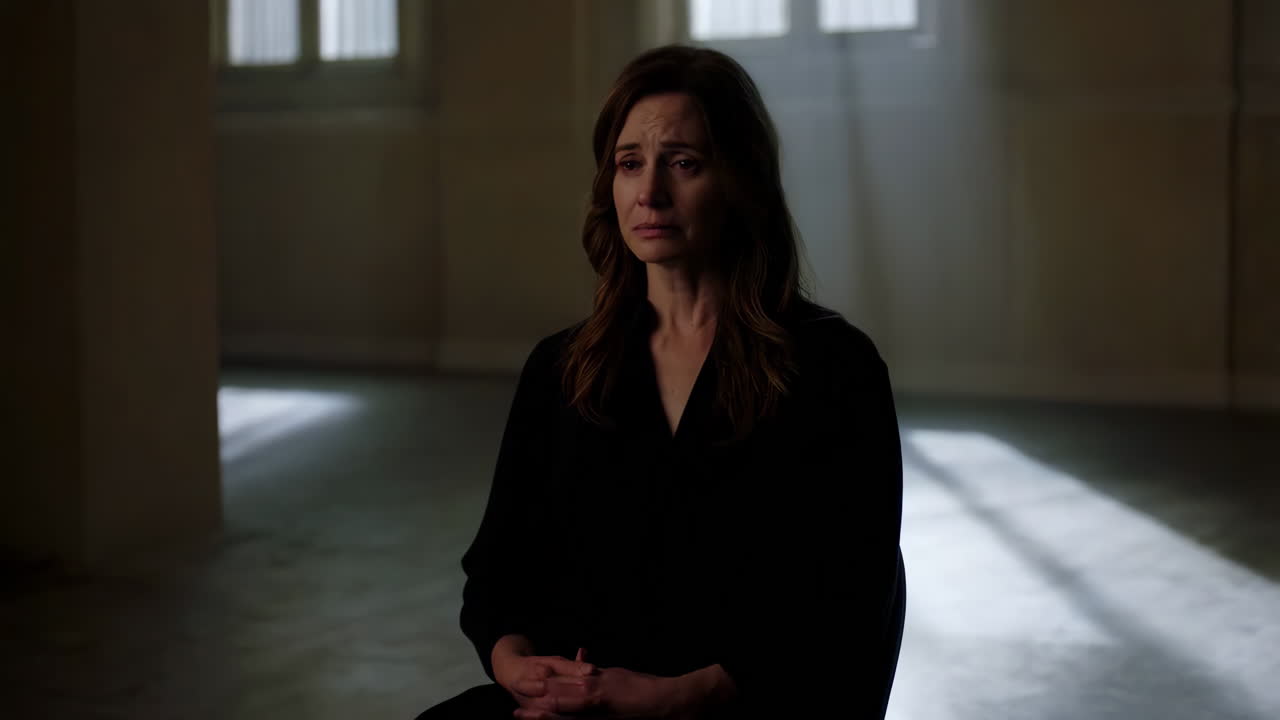 Woman in Interview Room