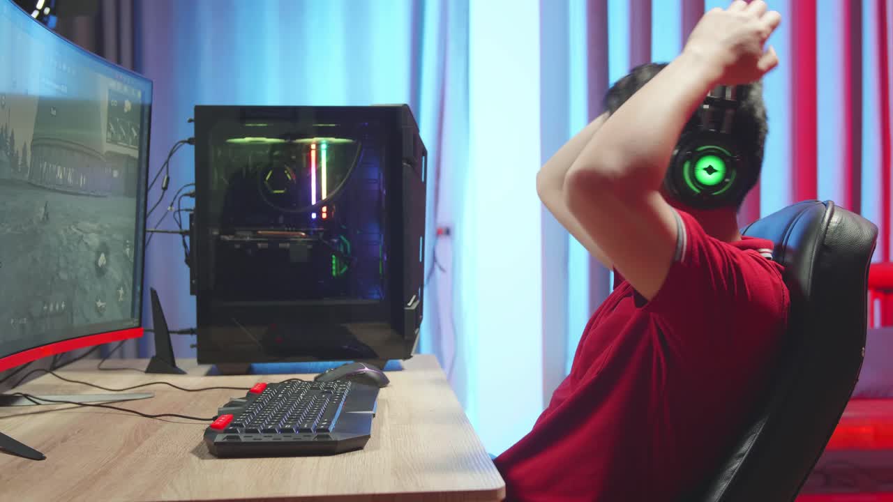 Asian Man Playing Survival Shooter Games And Lose