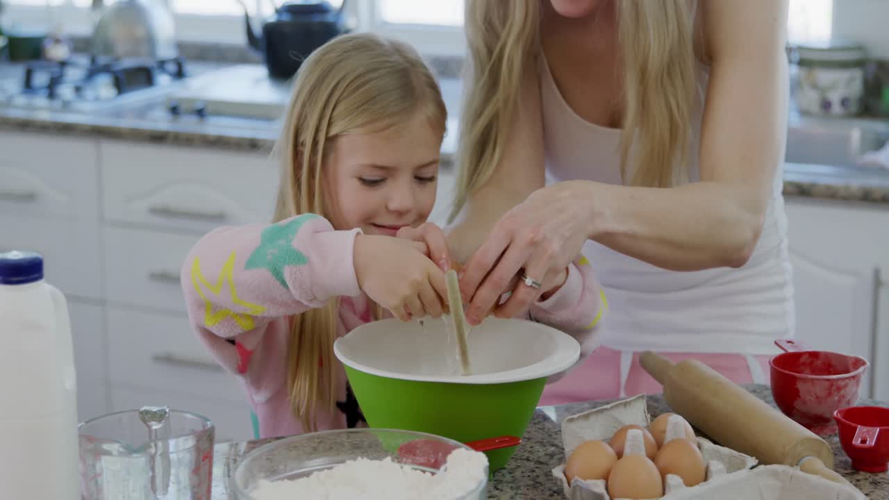 Family making Christmas cookies at home