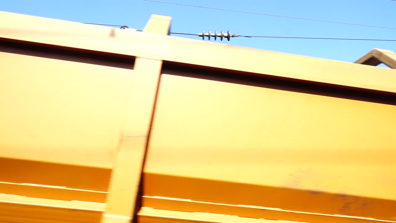 Rail-laying machine. Railway tracklayers. Railroad construction. Railroad track laying machine at work. Supporting machinery on the railway line