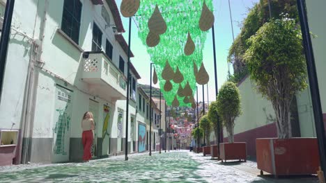 charming street decorated with recycled bottles