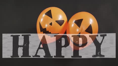 Happy-halloween-text-banner-over-two-halloween-pumpkin-printed-balloons-against-black-background