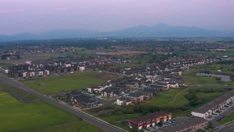 new rapid development suburban town home and apartments sprawl across bozeman montana, aerial pedestal