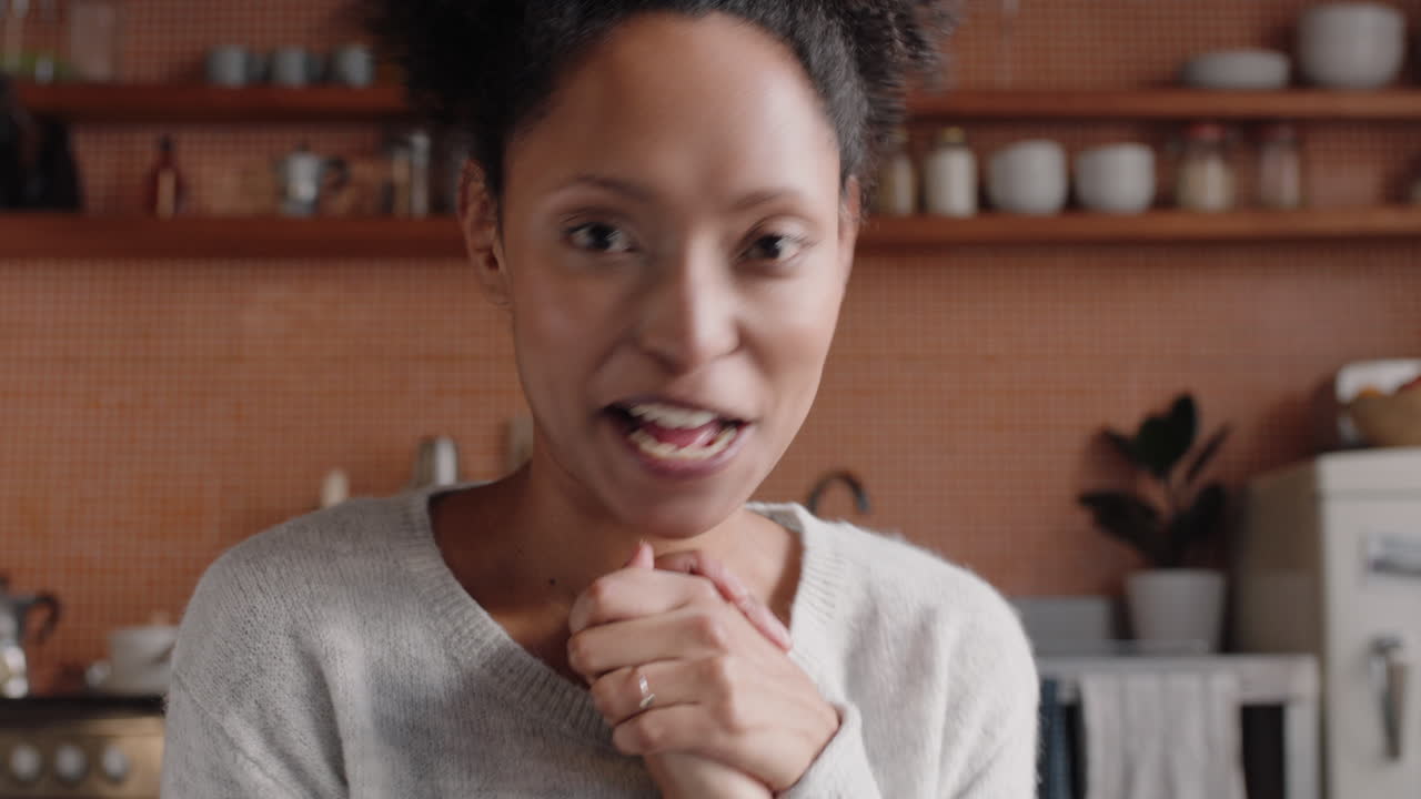 beautiful woman having video chat using webcam at home sharing exciting lifestyle chatting to friend looking surprised enjoying online communication on horizontal screen