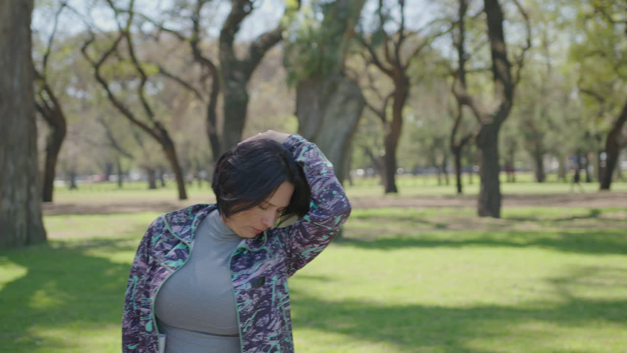 Women Stretching in a Park