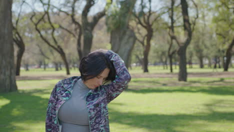 women stretching in a park