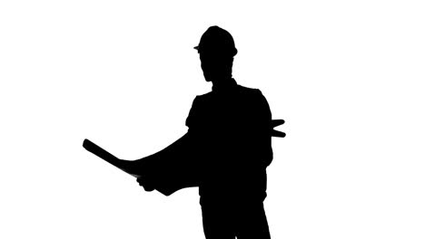 shadow of a site worker holding a site map with white background