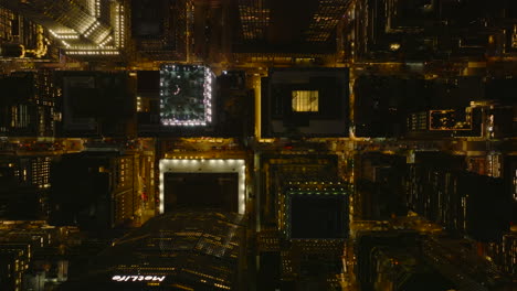 Aerial-birds-eye-overhead-top-down-view-of-night-city-around-MetLife-building-and-Grand-Central-station.-Manhattan,-New-York-City,-USA