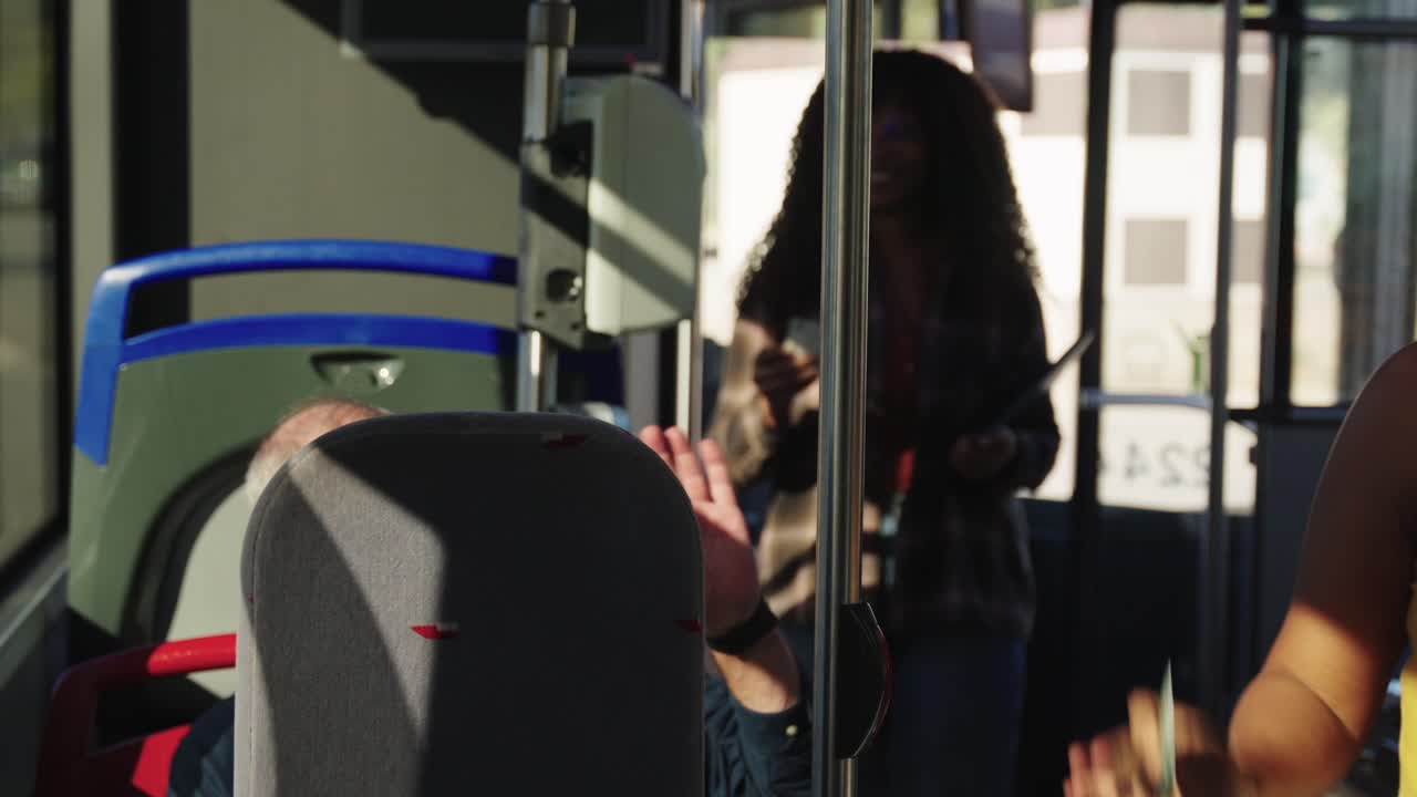 A woman riding the bus