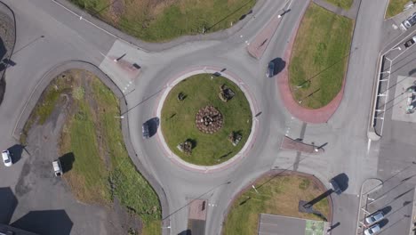 top down above circular roundabout in small hella town, iceland